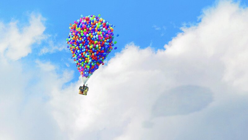 house lifted by balloons