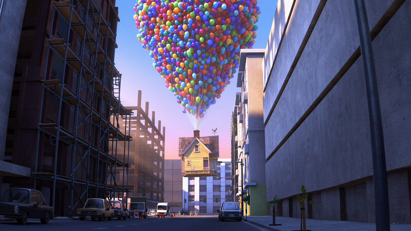 house lifted by balloons