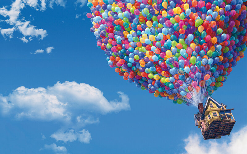 house lifted by balloons