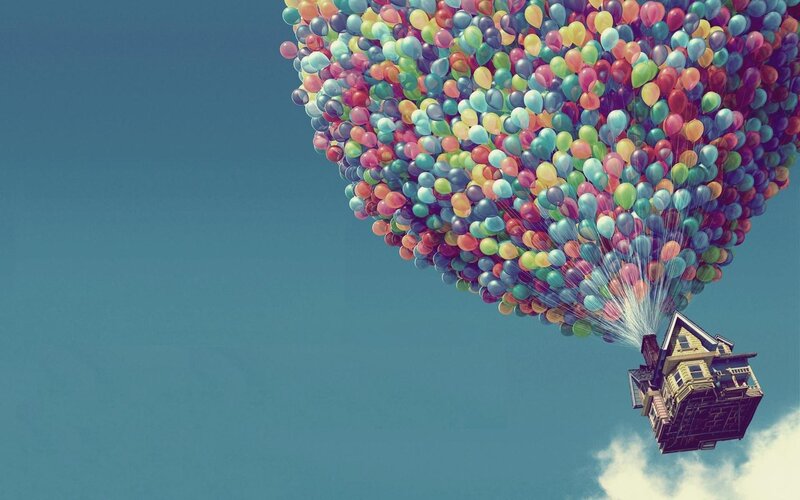 house lifted by balloons