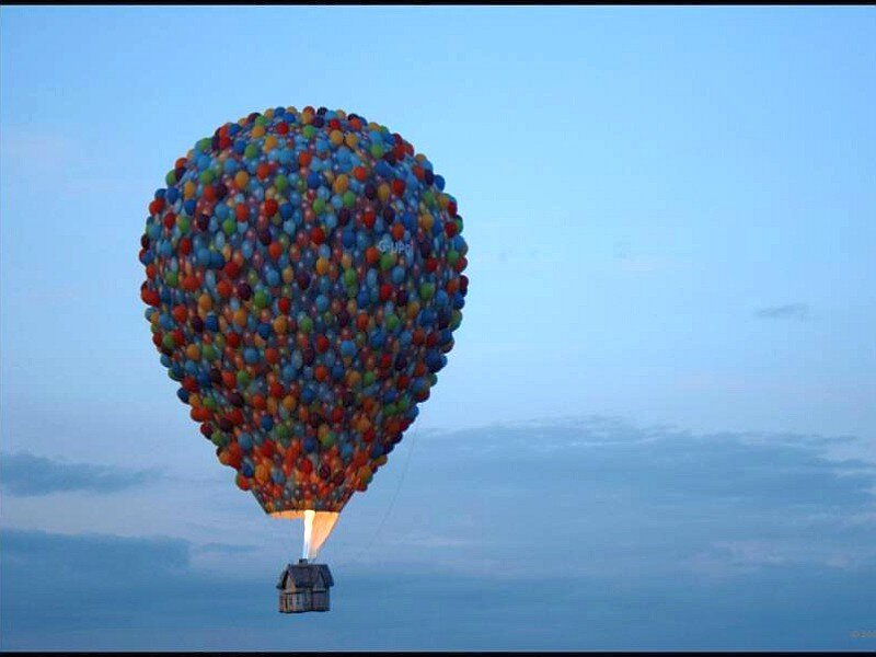 House lifted by balloons