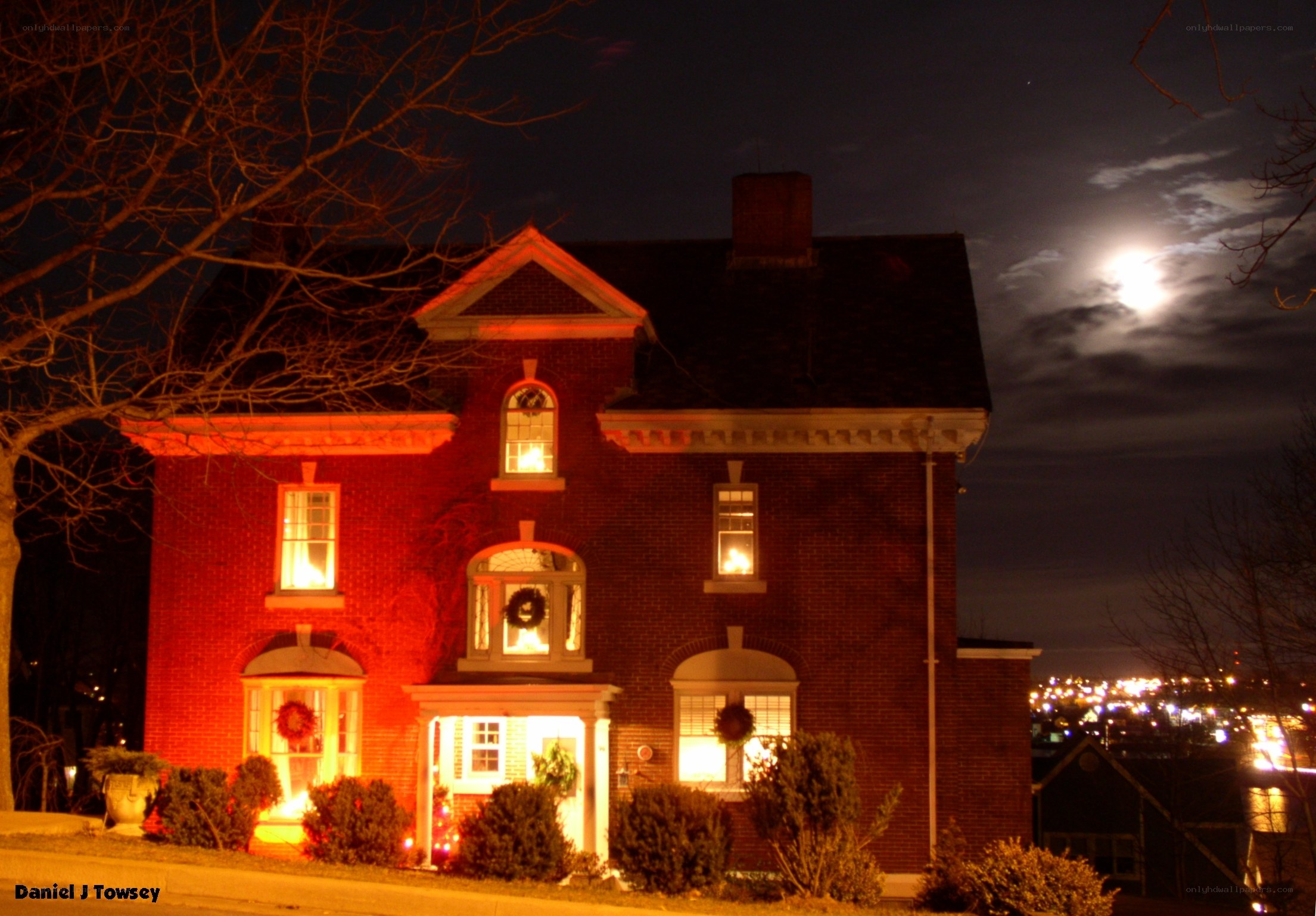House lit for Christmas at night