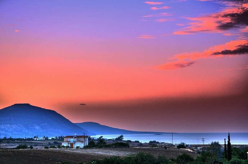 House Near Sea at Sunset