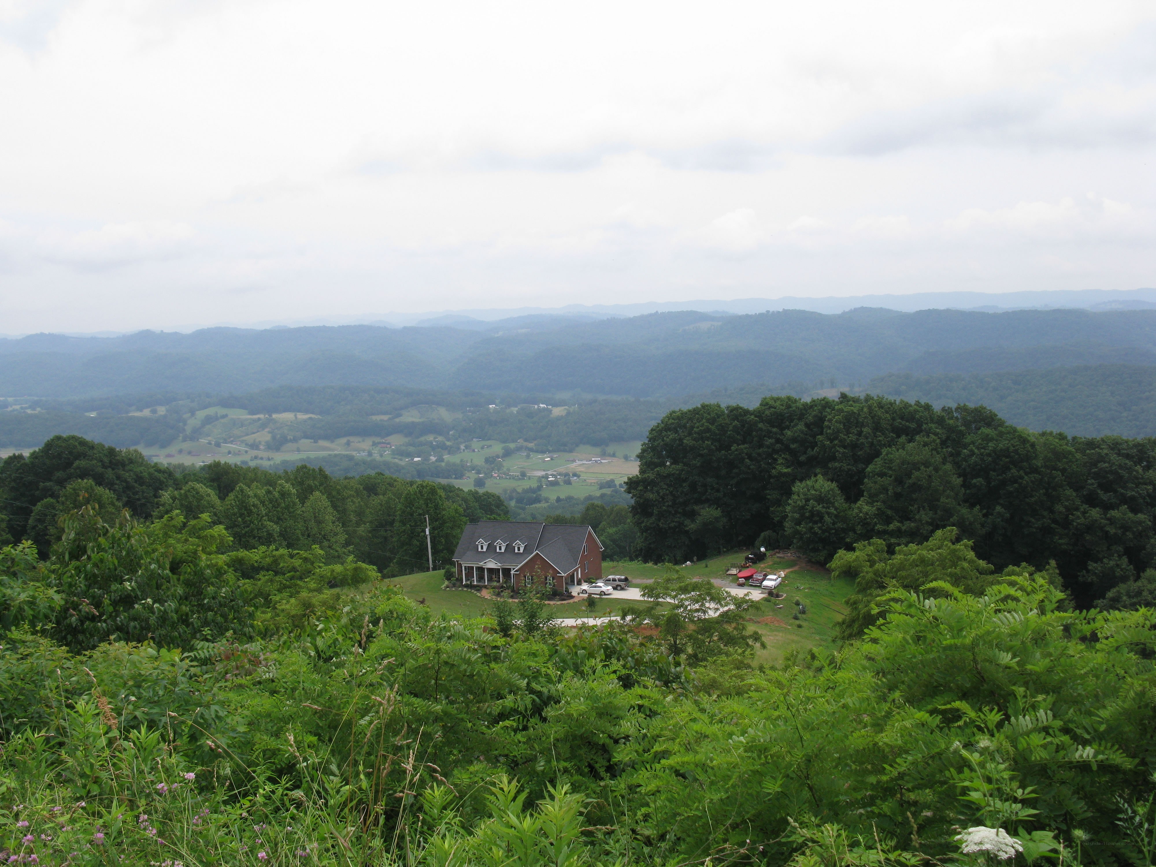 House on a hill with mountain views