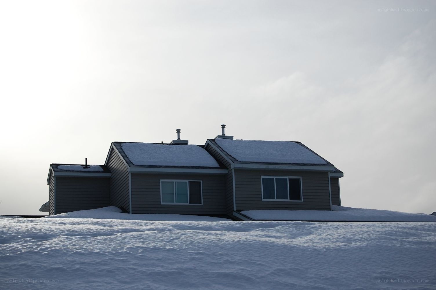 House on a snowy hill