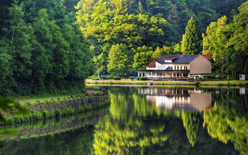 House on Lake Shore — Green, Serene, Afternoon, Photograph