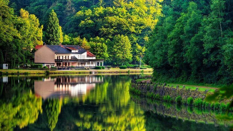 House on Riverbank — Green, Serene