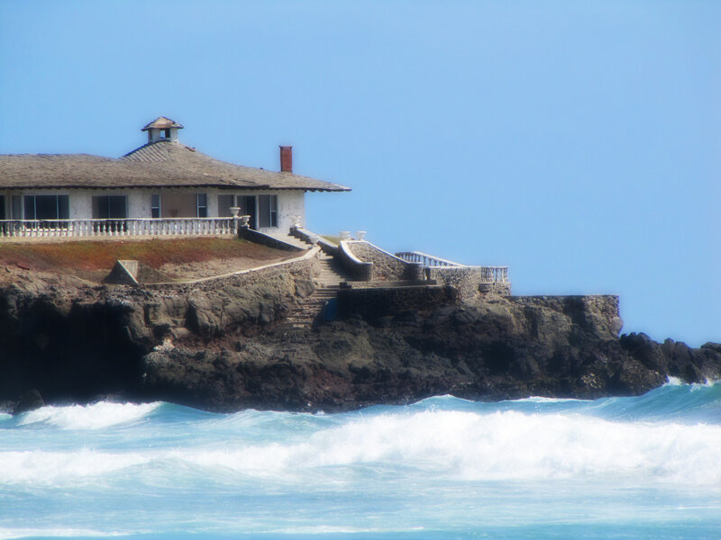 House on Rocky Cliff