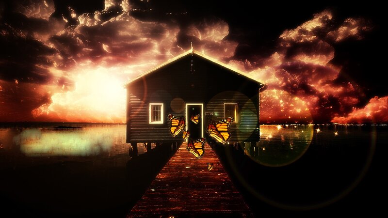 House on the water at sunset