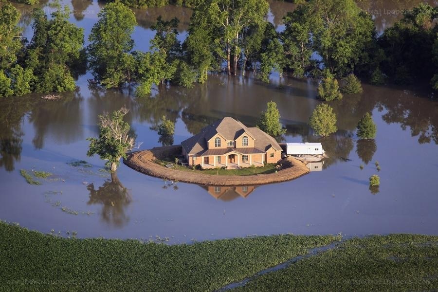 House surrounded by floodwaters