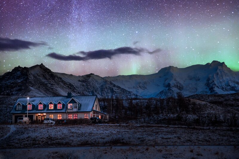 House under Aurora Borealis
