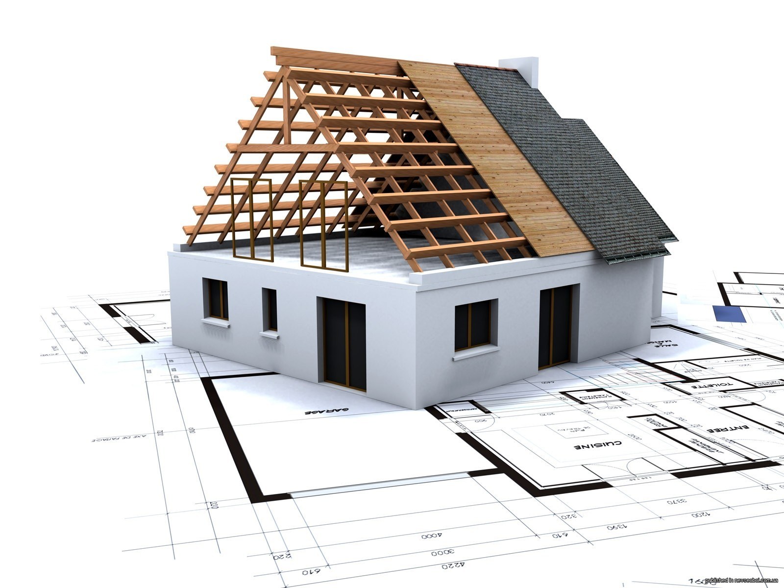 House under construction on blueprints