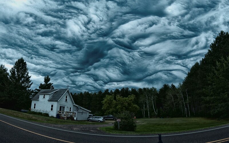 House under Storm Clouds