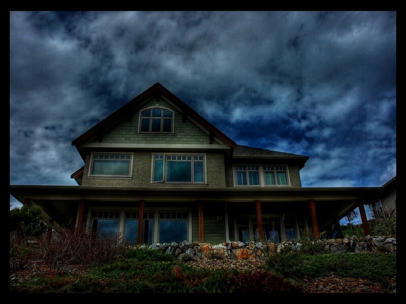 House under stormy sky