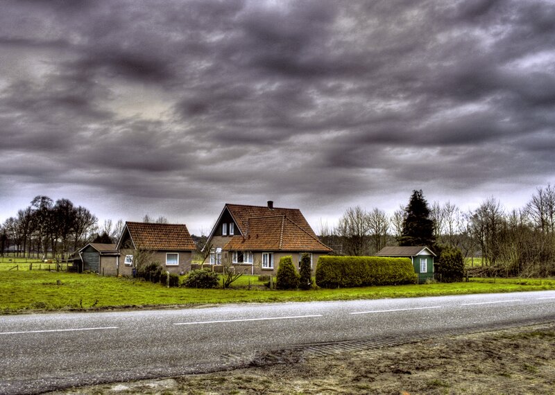 House under stormy sky