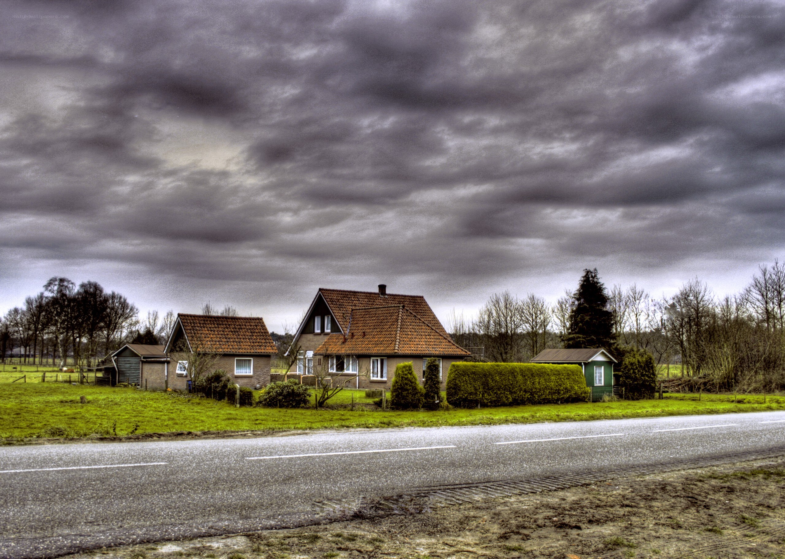 House under stormy sky