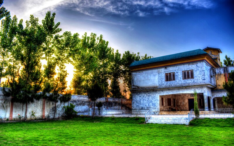 House with Green Lawn