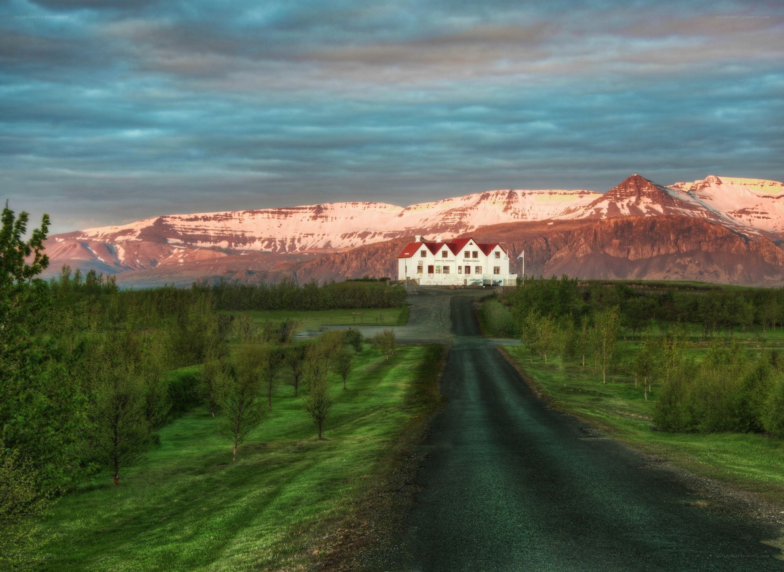 House with mountains in the background