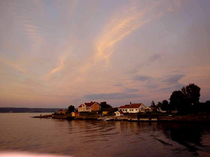 Houses at dusk by the water