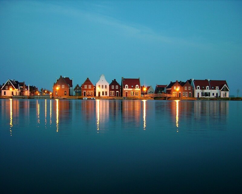Houses on a canal at dusk