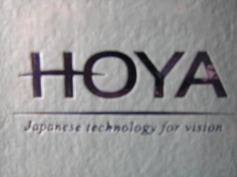 Hoya logo on textured surface