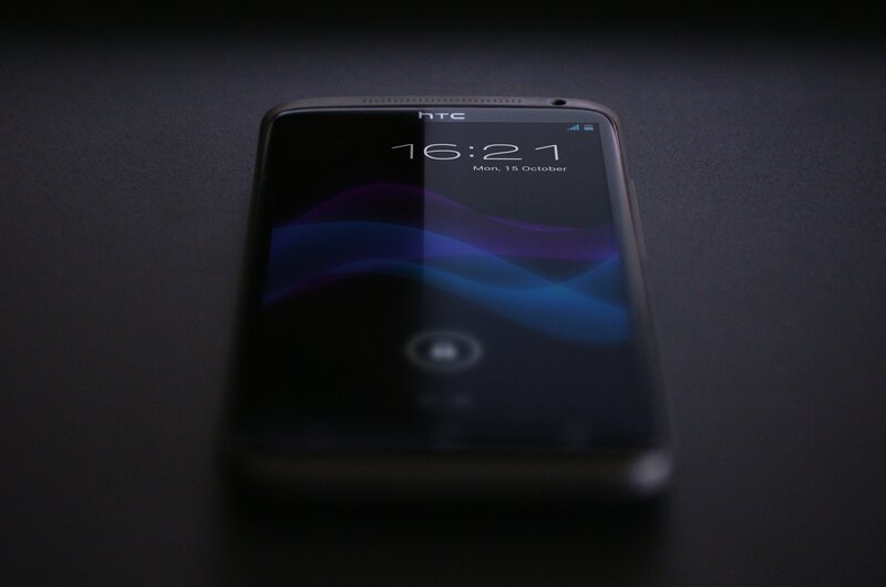 HTC smartphone on dark surface