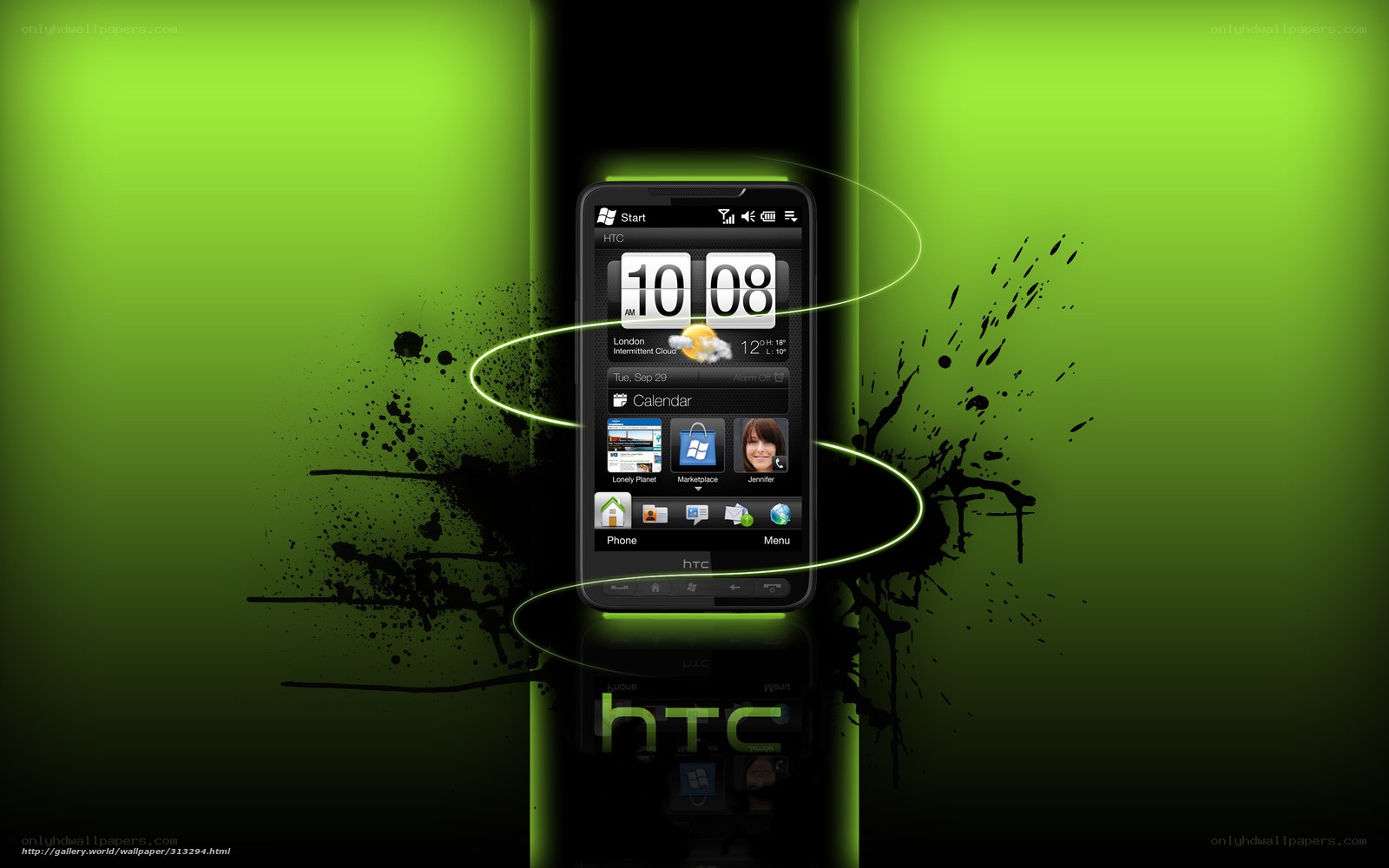 HTC smartphone on green background