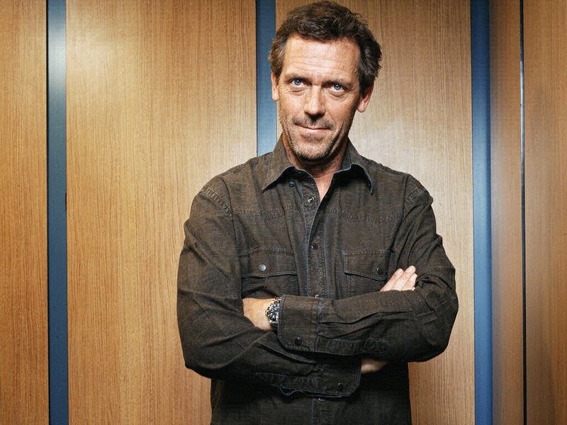 Hugh Laurie in a brown shirt