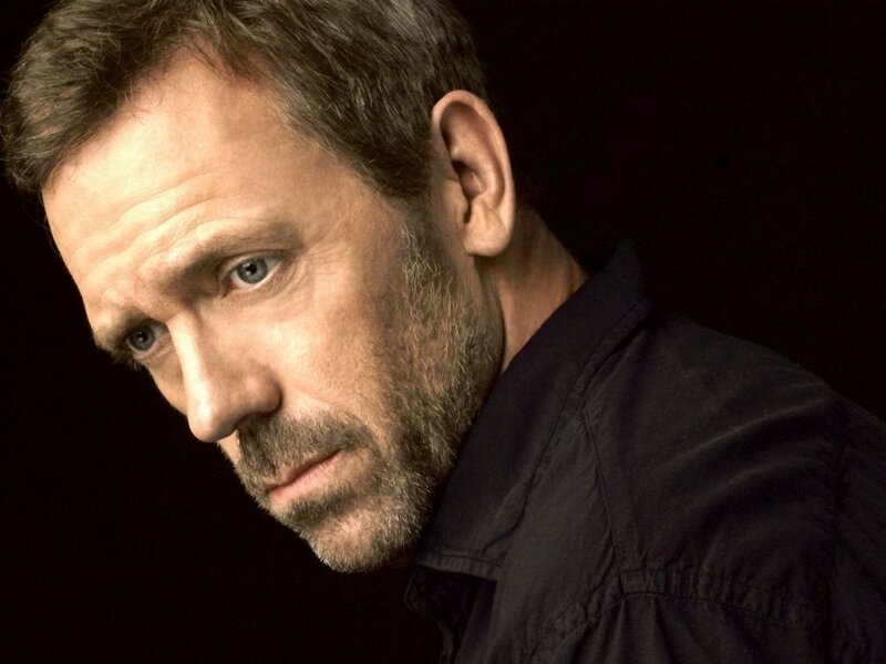 Hugh Laurie in a dark shirt