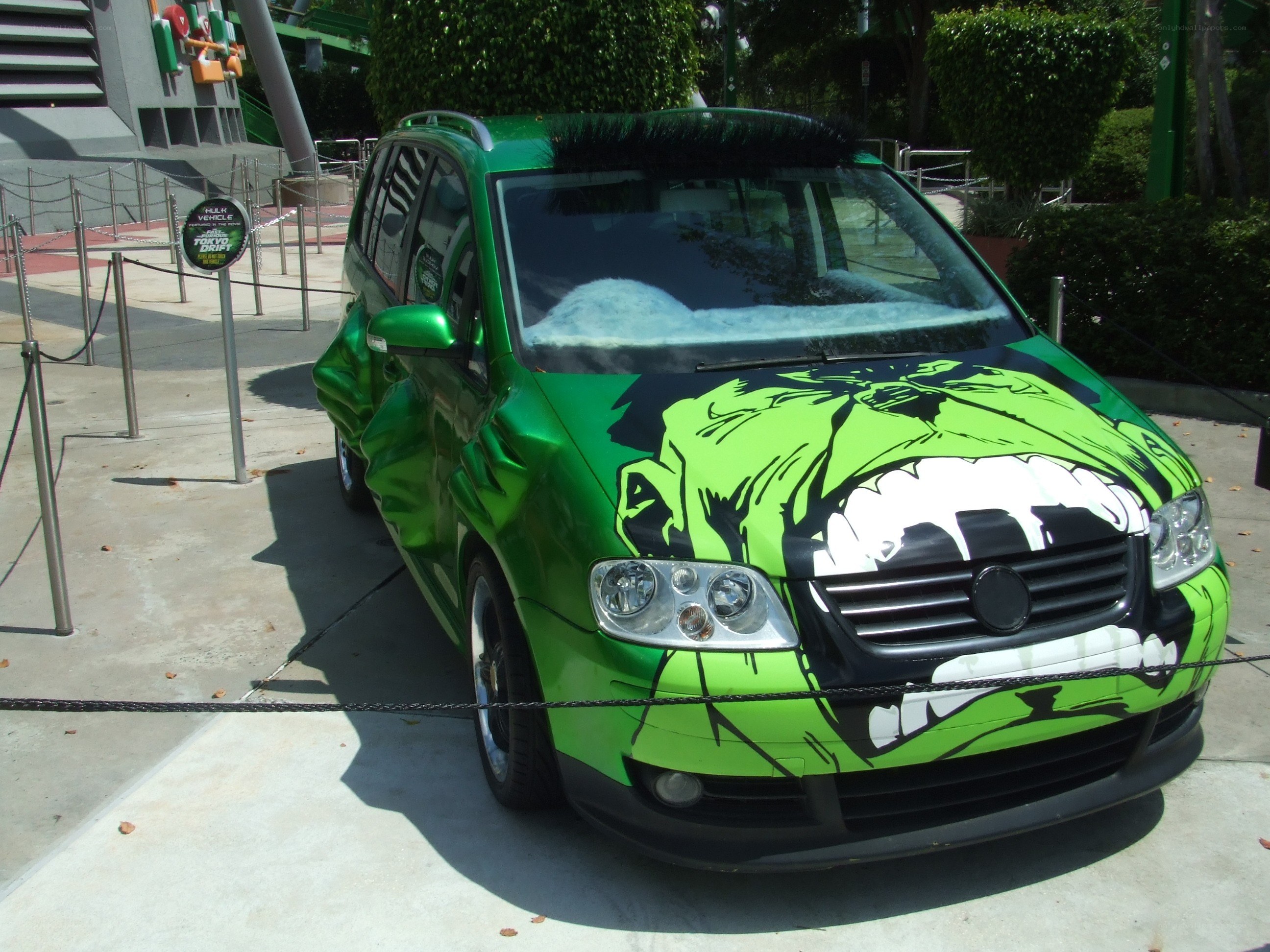 Hulk-themed car at theme park