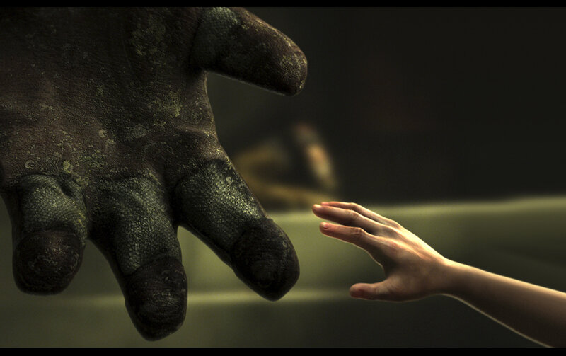 Human hand reaching for a monster's hand