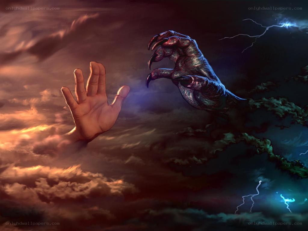 Human hand reaching toward monster claw