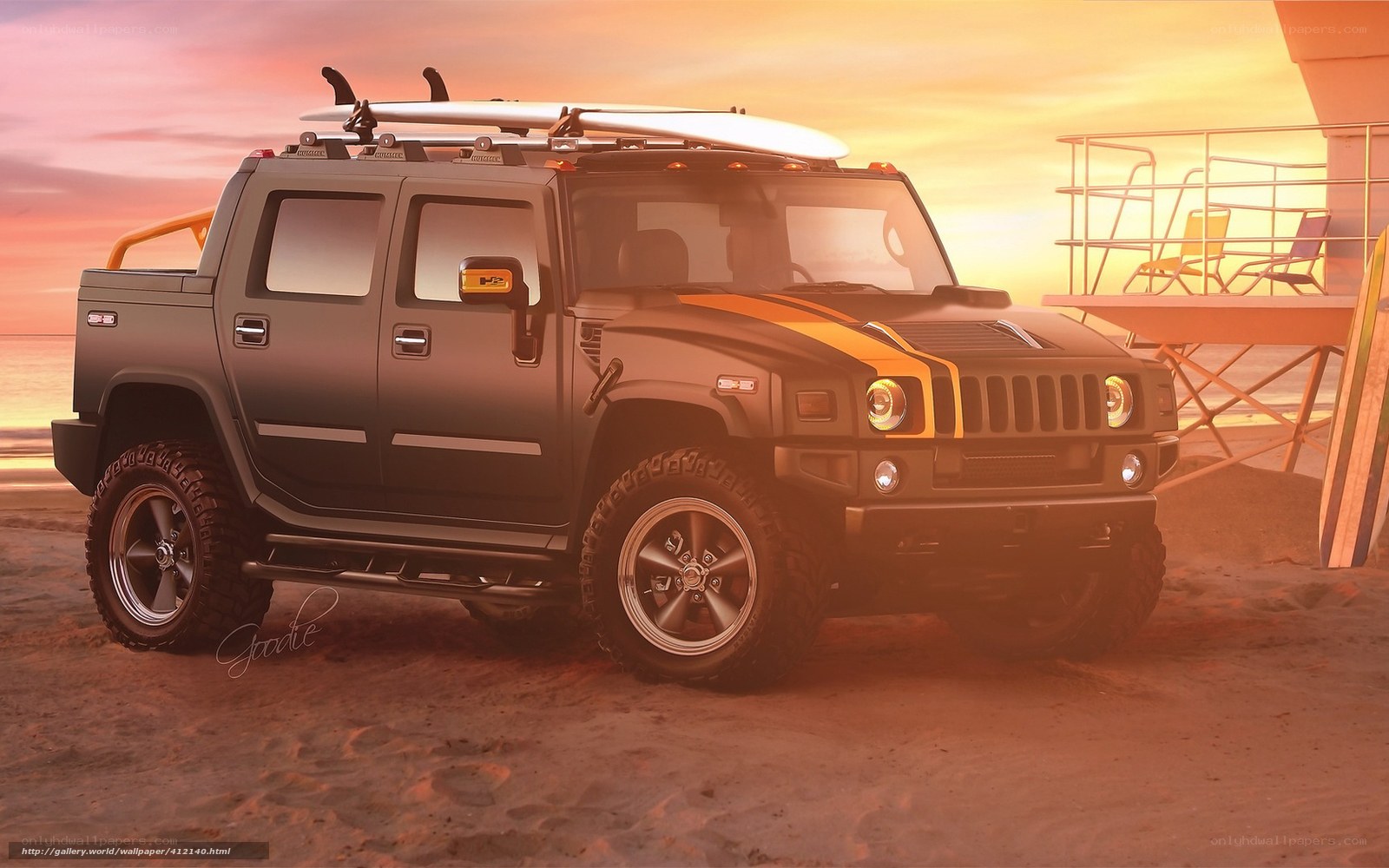 Hummer at the beach with surfboard