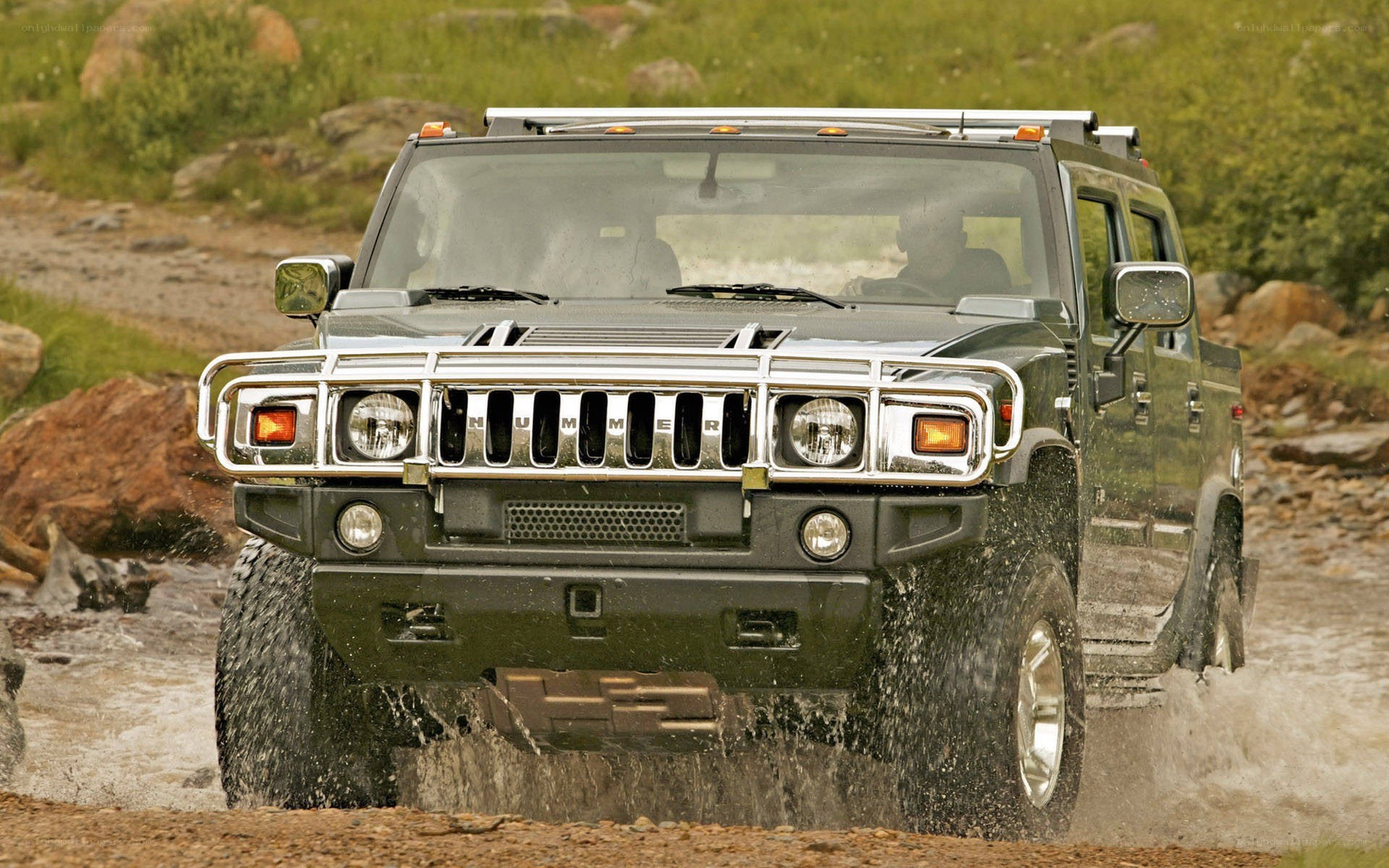 Hummer driving through water