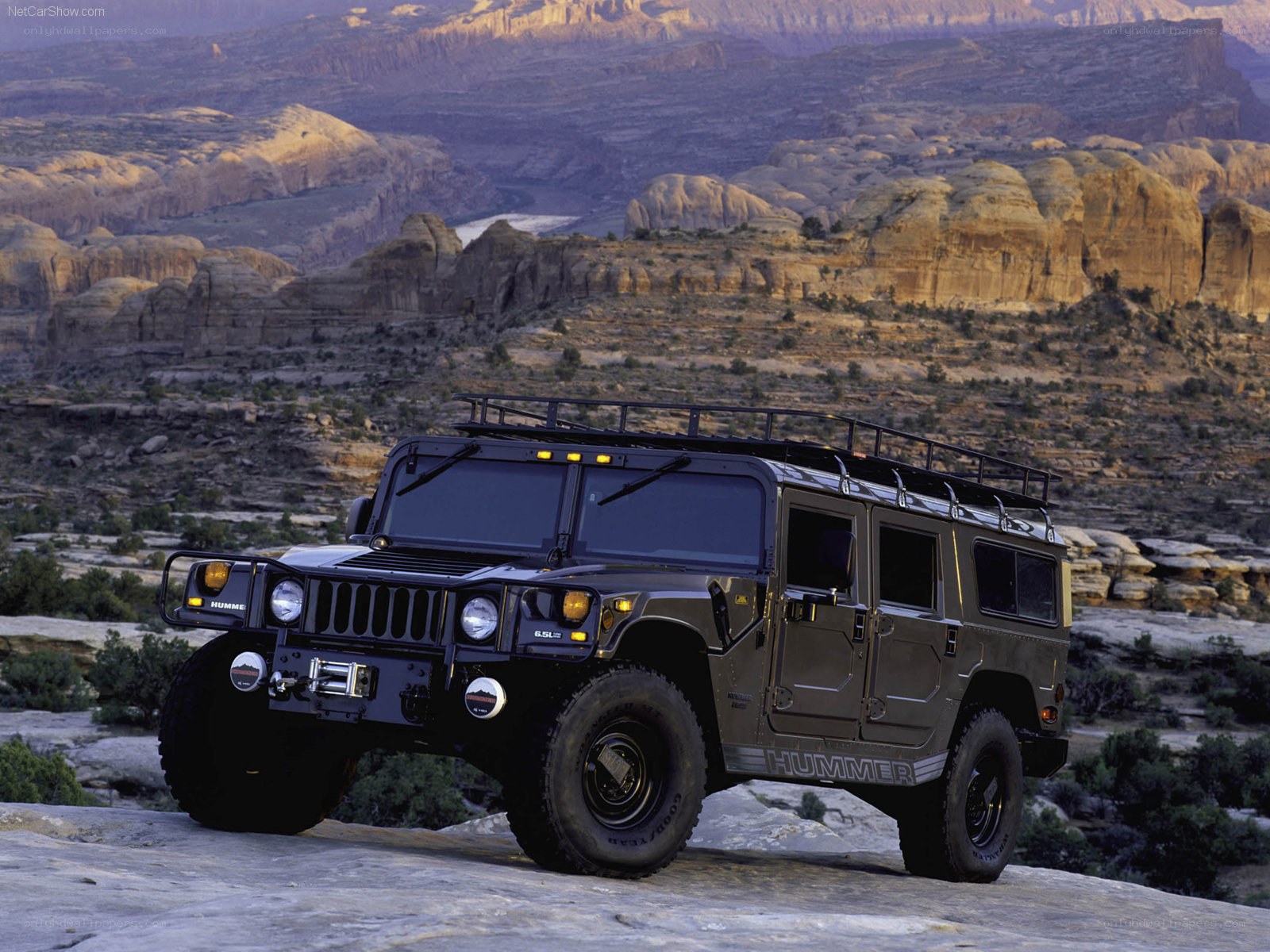 Hummer H1 in desert landscape
