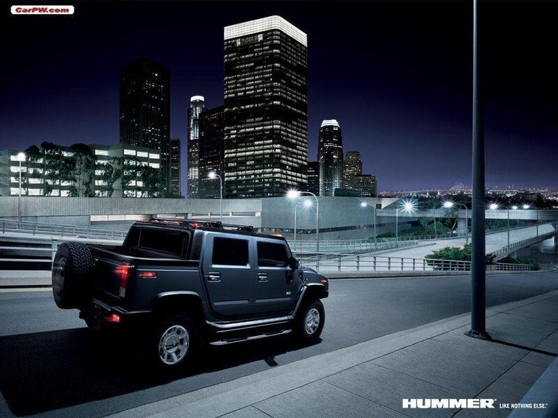 Hummer H2 at night in city