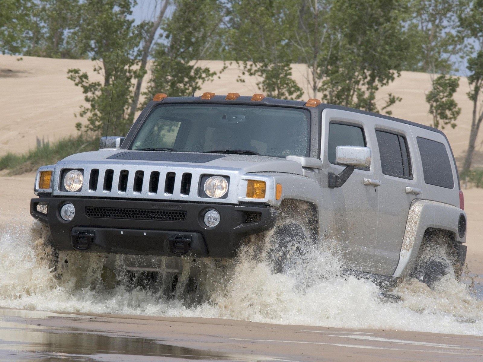 Hummer H3 driving through water