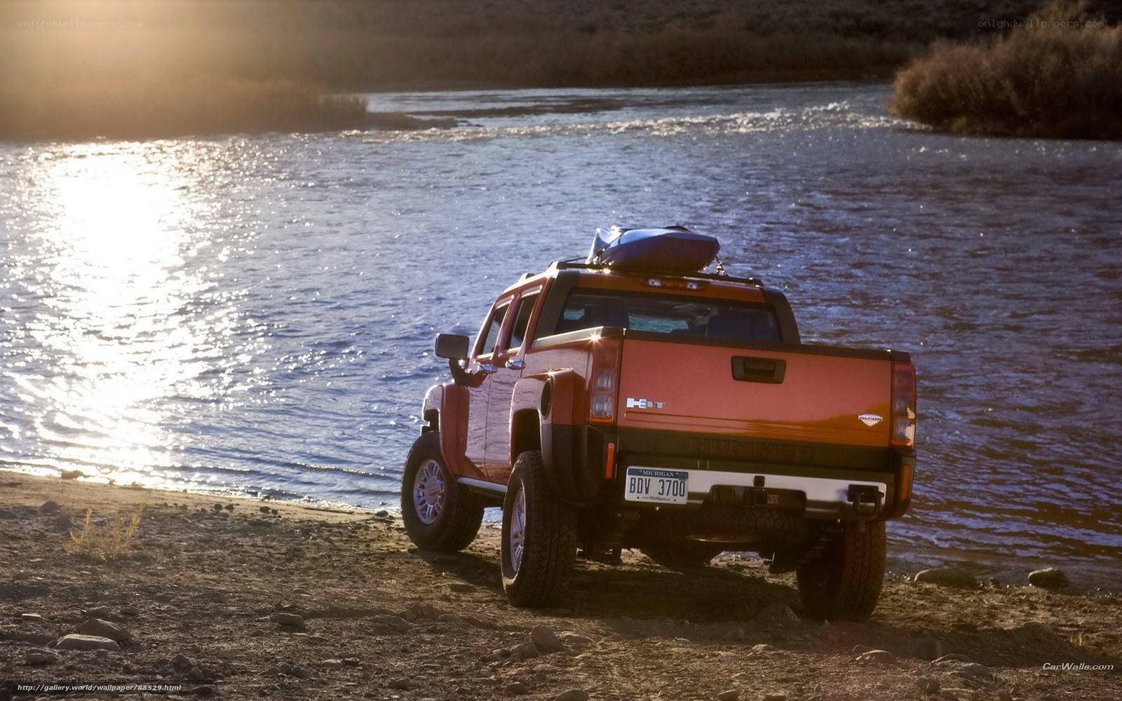 Hummer H3T by a river