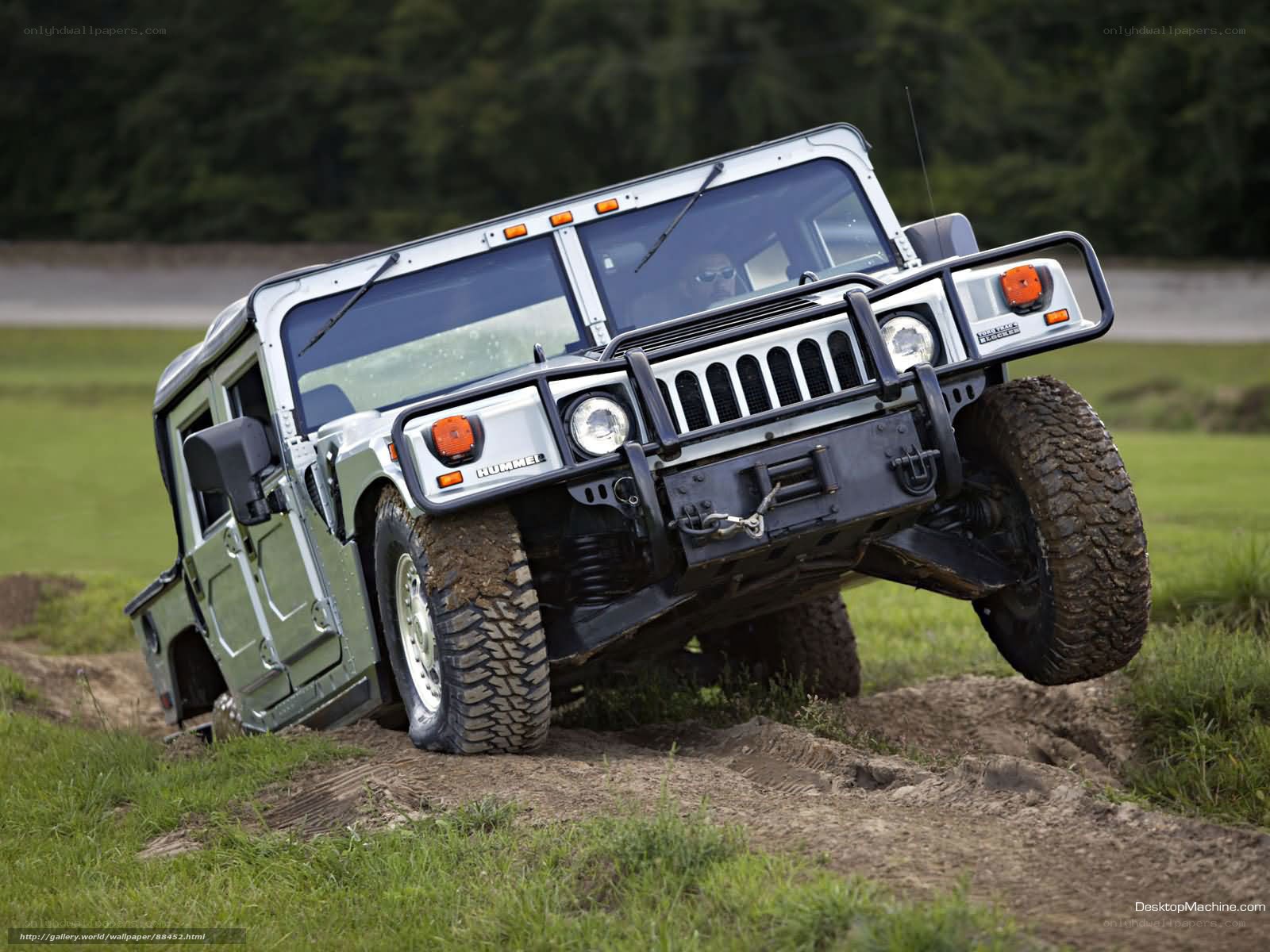 Hummer off-roading on dirt