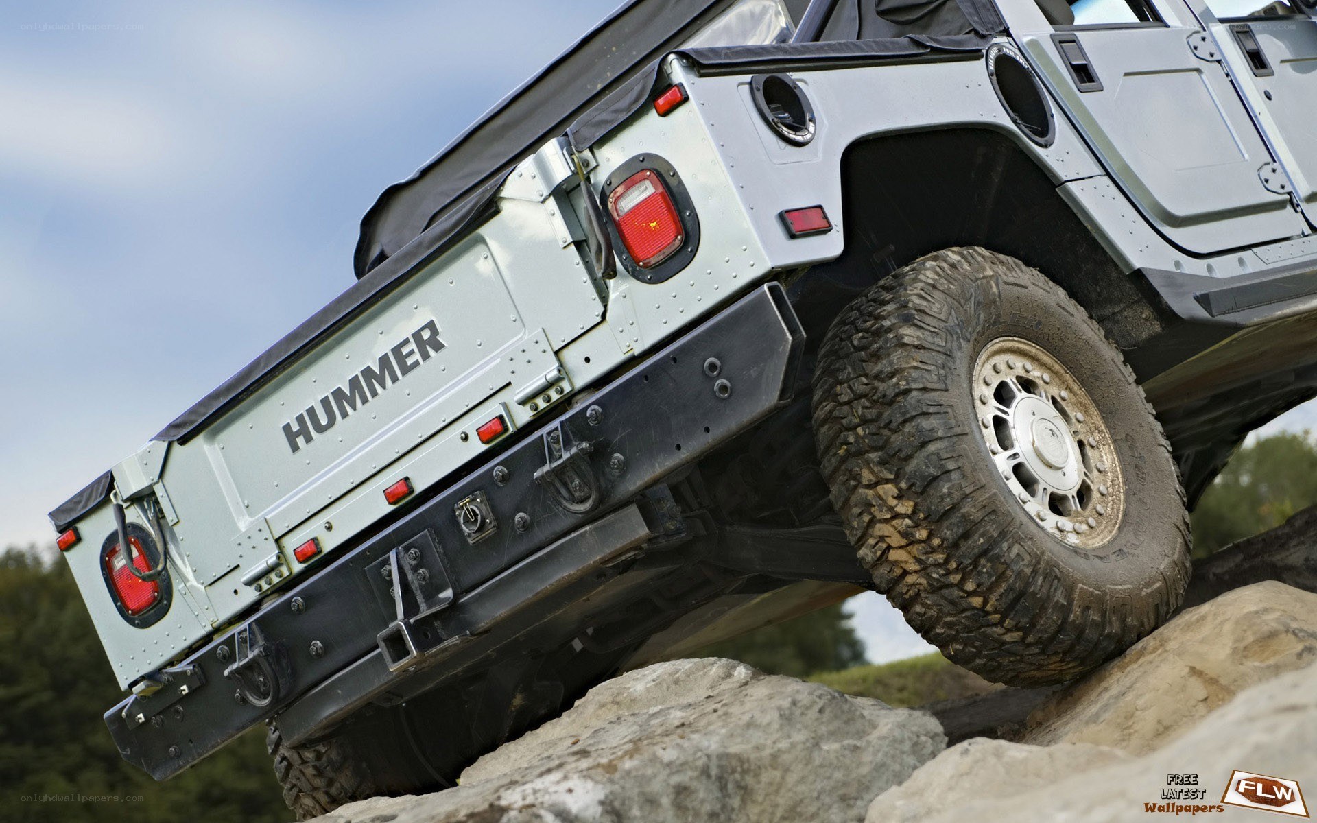 Hummer off-roading on rocks