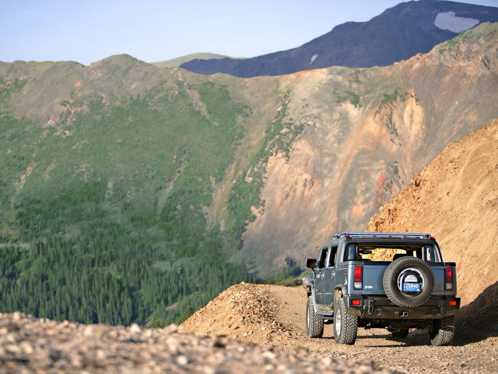 Hummer on a mountain trail