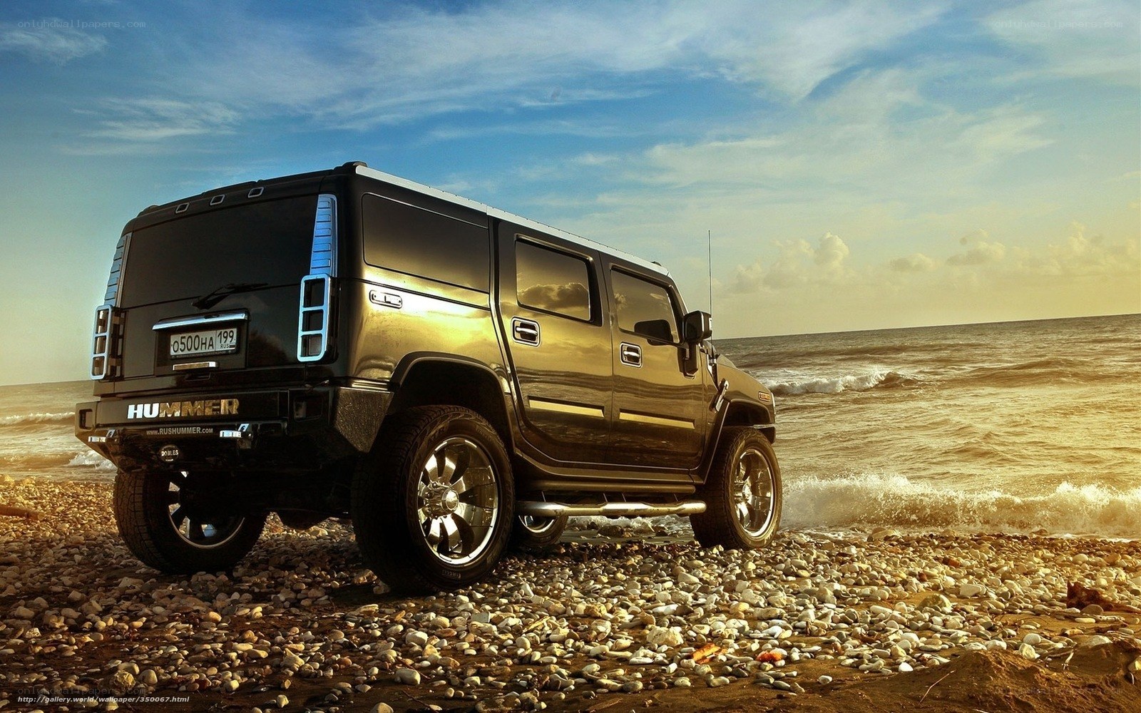 Hummer on a pebble beach