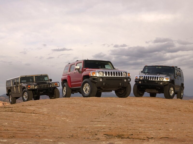Hummer vehicles on a rocky hill