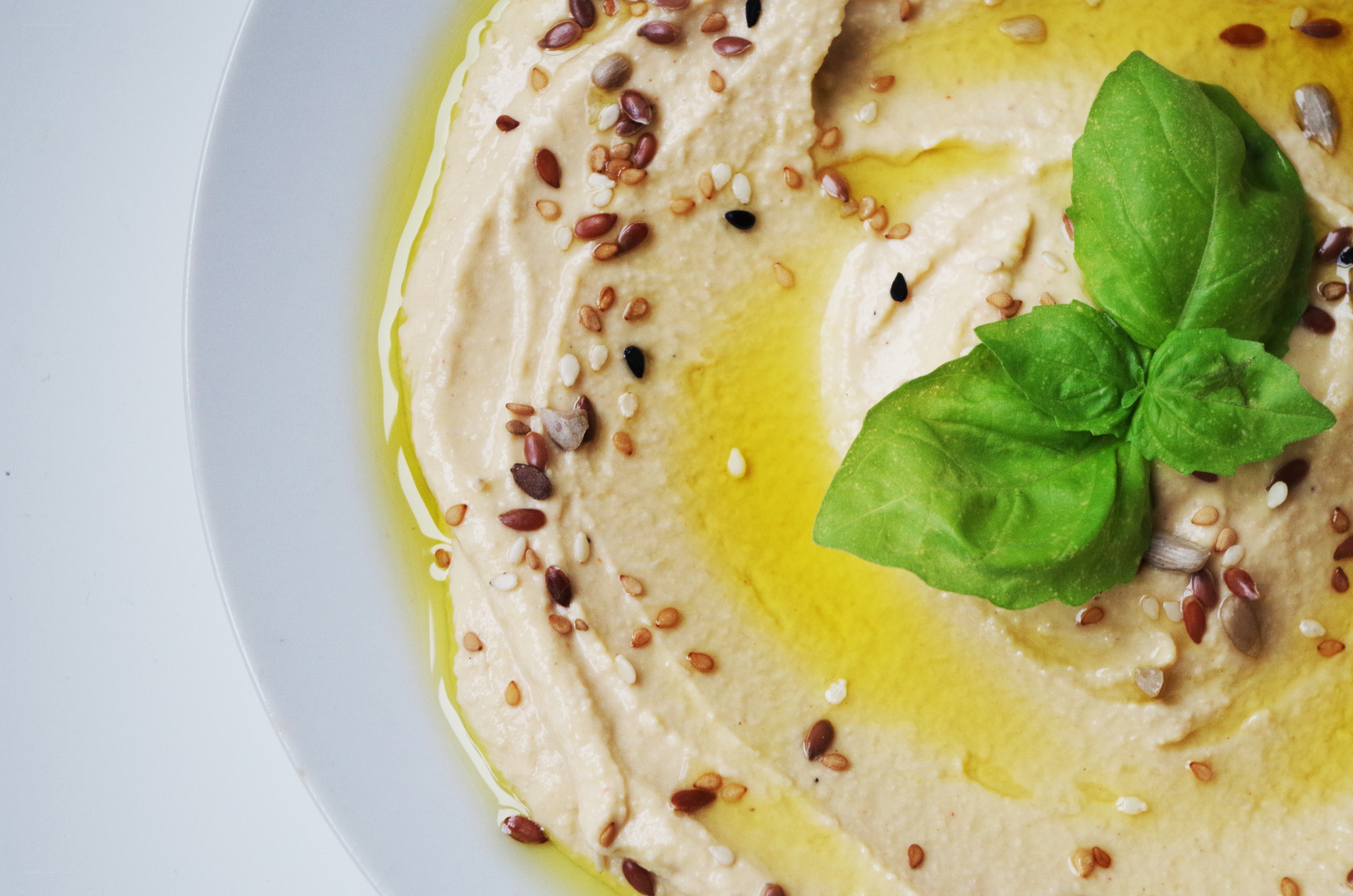 hummus with basil and seeds