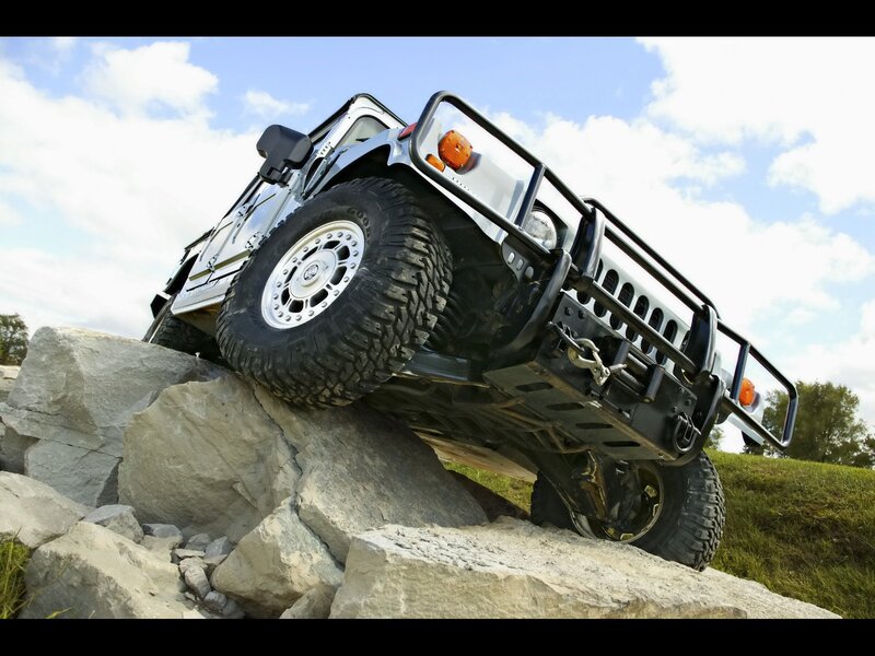 Humvee climbing rocky terrain