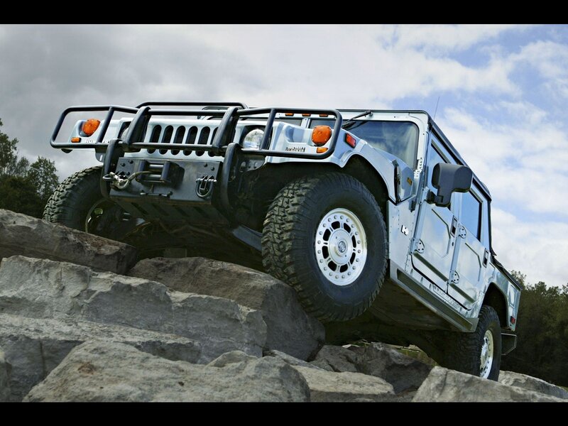 Humvee climbing rocky terrain