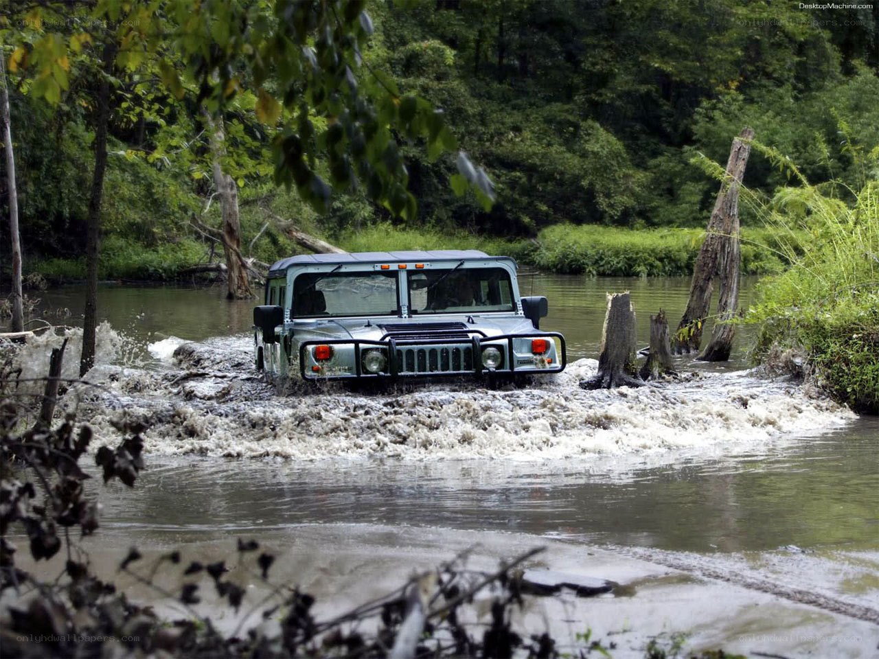 Humvee crossing a river