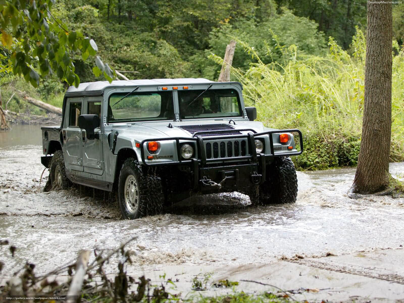Humvee crossing a river