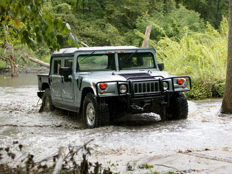 Humvee crossing a stream