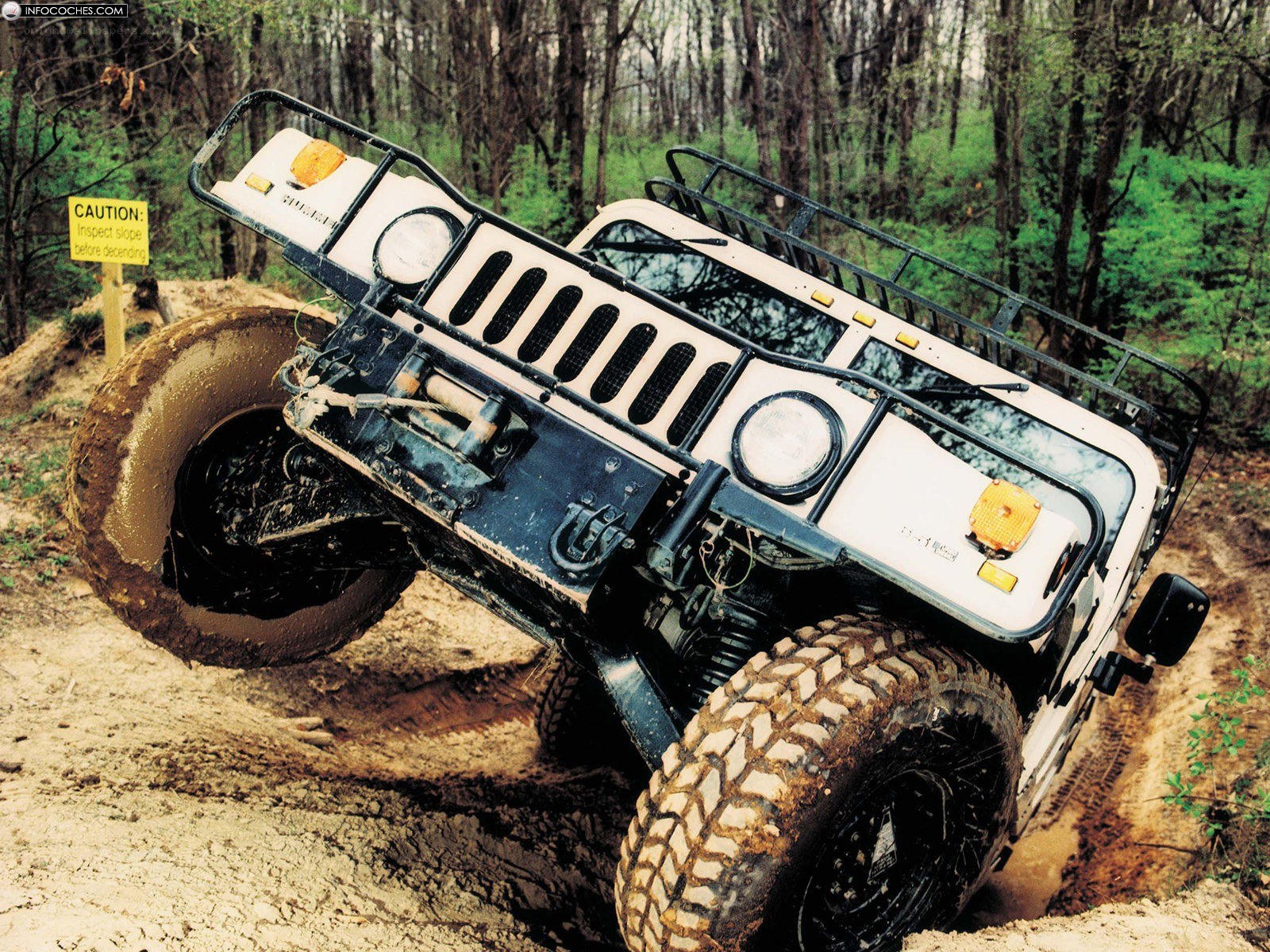 Humvee navigating muddy terrain